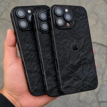 iPhone case with textured black stone matte finish and Apple logo cutout